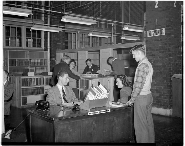 picture of students at reference desk 1947, University of Illinois Navy Pier Campus
