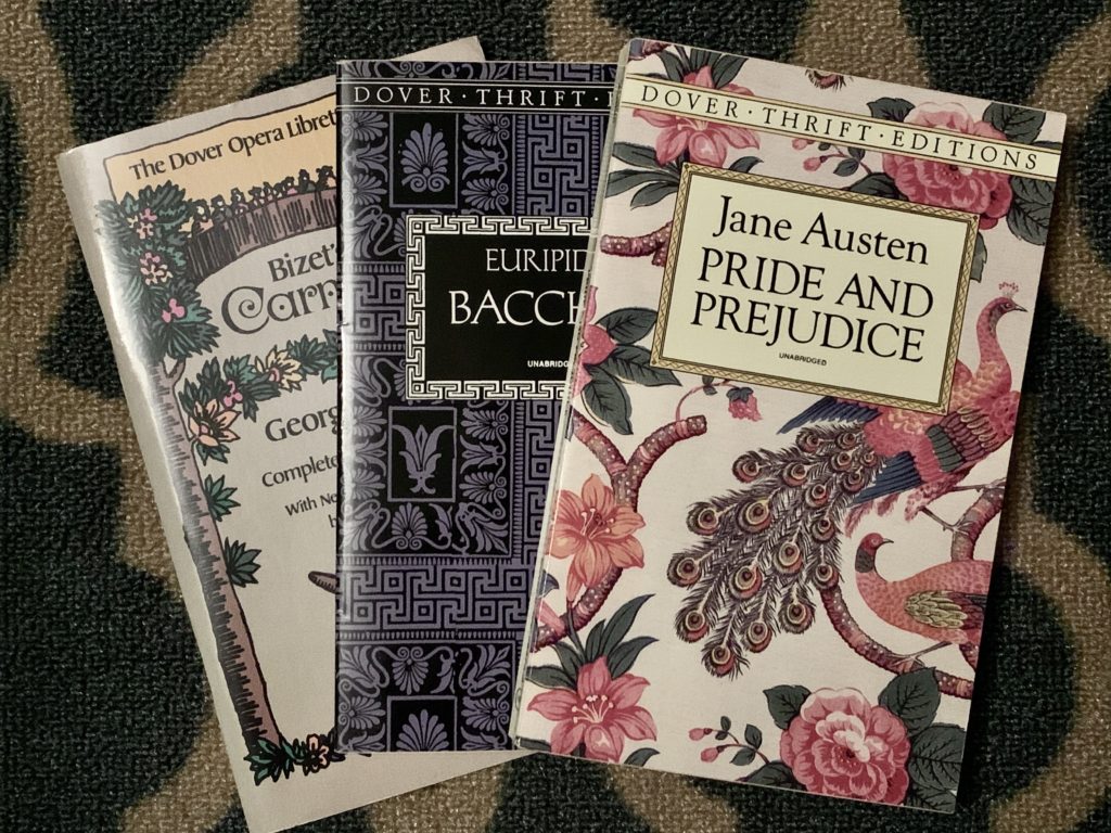 Dover editions of Bizet's Carmen, Euripides's Bacchae, and Austen's Pride and Prejudice.