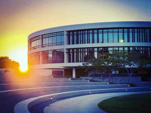 sunset behind William h. Hannon Library