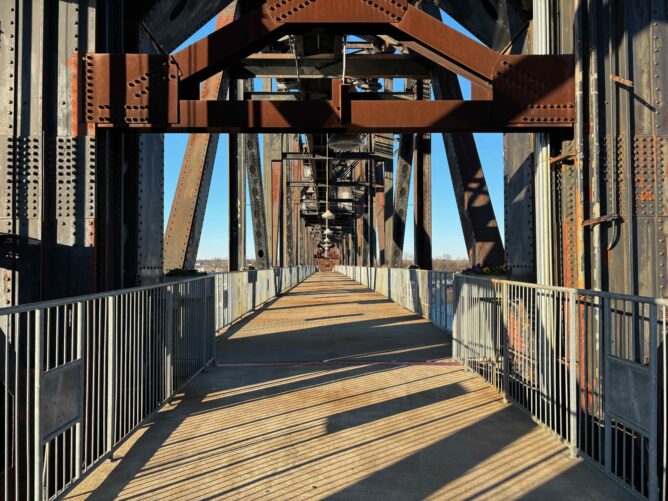 old railway bridge that has been converted into a pedestrian walkway