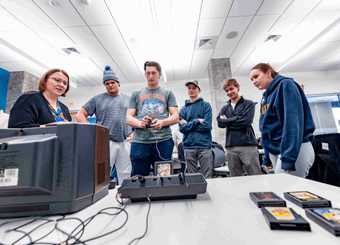 students playing an Atari game