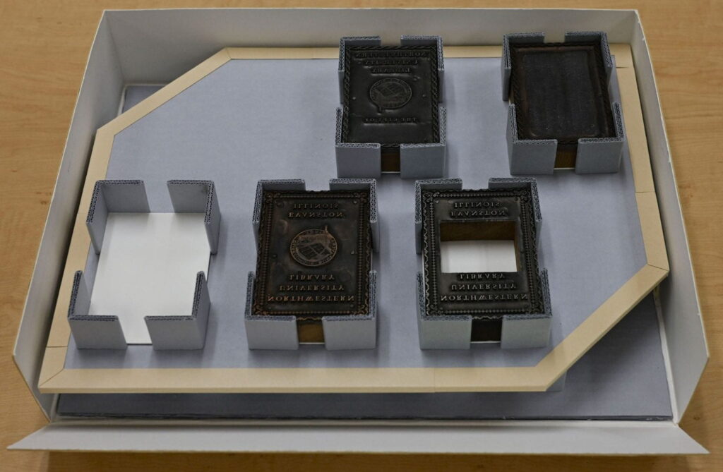 printing plates housed in corrugated box with custom corners holding them in